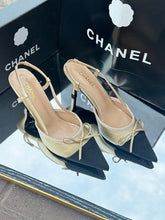 Chanel Beige and Black Slingback Heels with Bow Detail – Iconic Designer Shoes for Effortless Elegance