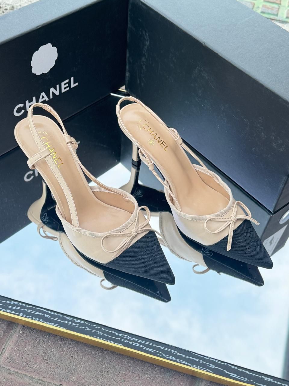 Chanel Beige and Black Slingback Heels with Bow Detail – Iconic Designer Shoes for Effortless Elegance